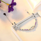  Elegantes Armband mit Herz aus violettem Zirkon