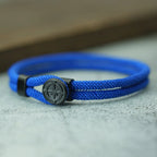 Seilarmband mit schwarzem Kompass Windrose königsblau