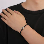 Seilarmband mit dem jüdischen Symbol des schwarzen und silbernen Davidsterns