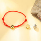 Seilarmband mit dem jüdischen Symbol des roten und goldenen Davidsterns