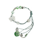 Seilarmband mit Perlen und Lotusblume