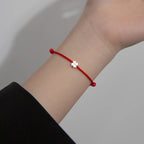 Seilarmband mit vierblättrigem Kleeblatt Weiß Rot