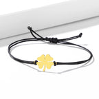 Seilarmband mit vierblättrigem Kleeblatt Glücksbringer schwarz und gold