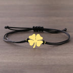 Seilarmband mit vierblättrigem Kleeblatt Glücksbringer schwarz und gold