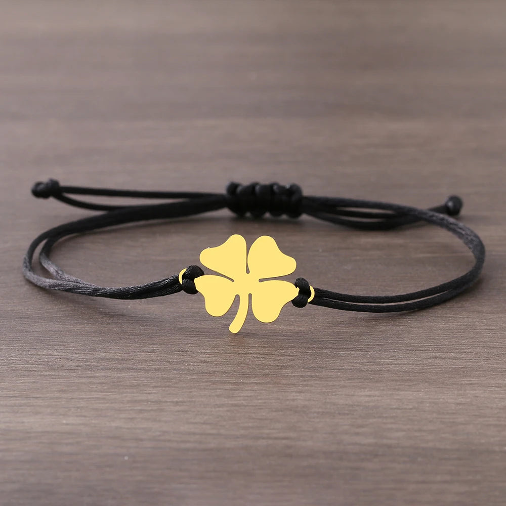 Seilarmband mit vierblättrigem Kleeblatt Glücksbringer schwarz und gold