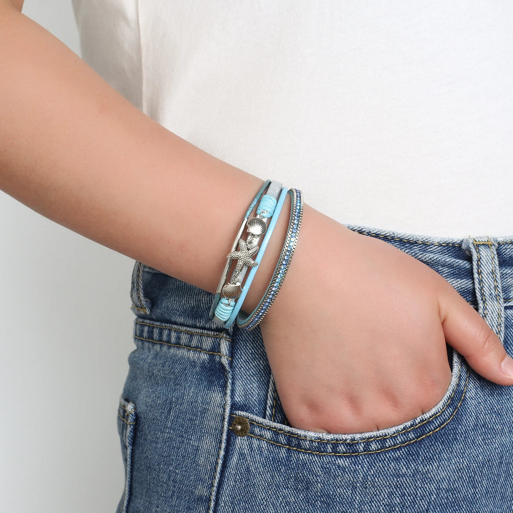 Armband aus Leder mit Muschel und Seestern in Blau