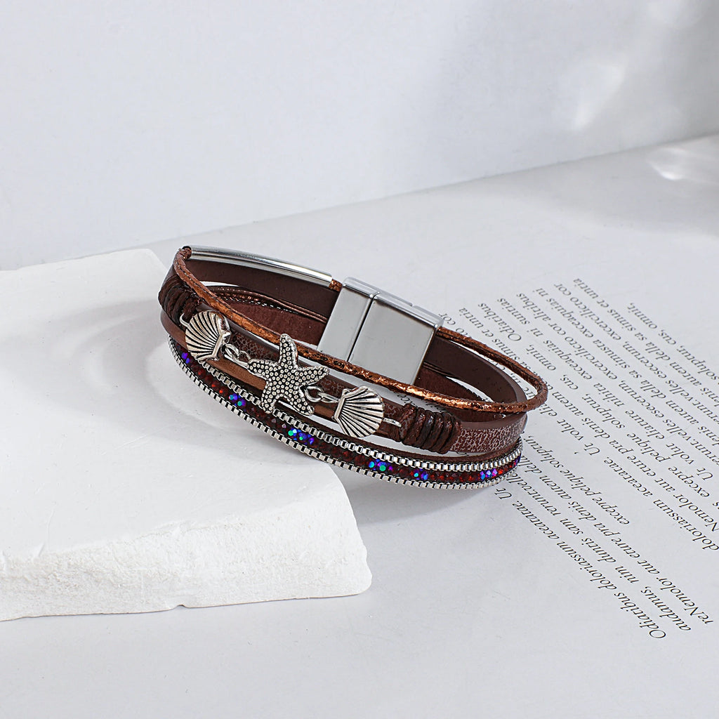 Armband aus Leder mit Muschel und Seestern in Braun