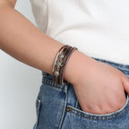 Armband aus Leder mit Muschel und Seestern in Braun