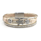 Armband aus Leder mit Muschel und Seestern in Weißgold