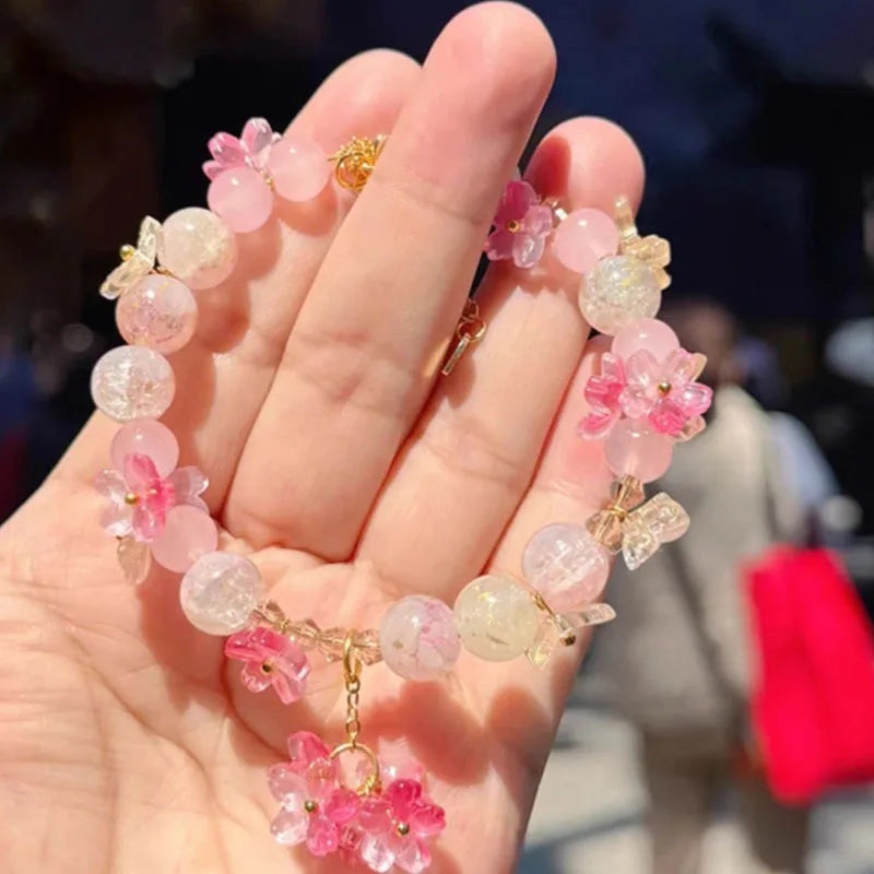 Perlenarmband mit rosa Blumen