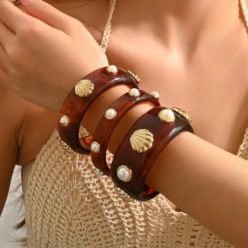 Armband aus Harz mit Bernsteinmuschel