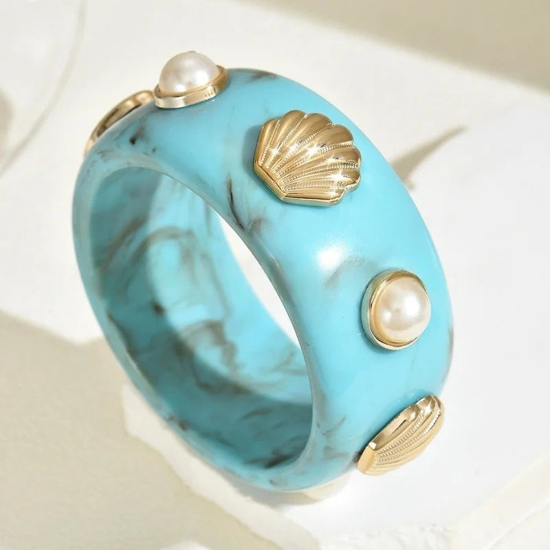 Armband aus Harz mit blauer Muschel