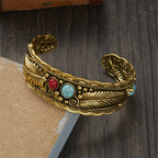 Vintage Ethnisches Armband mit Steinen und Federn in Gold