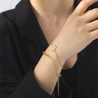 Winter-Doppel-Schneeflocken-Armband Gold