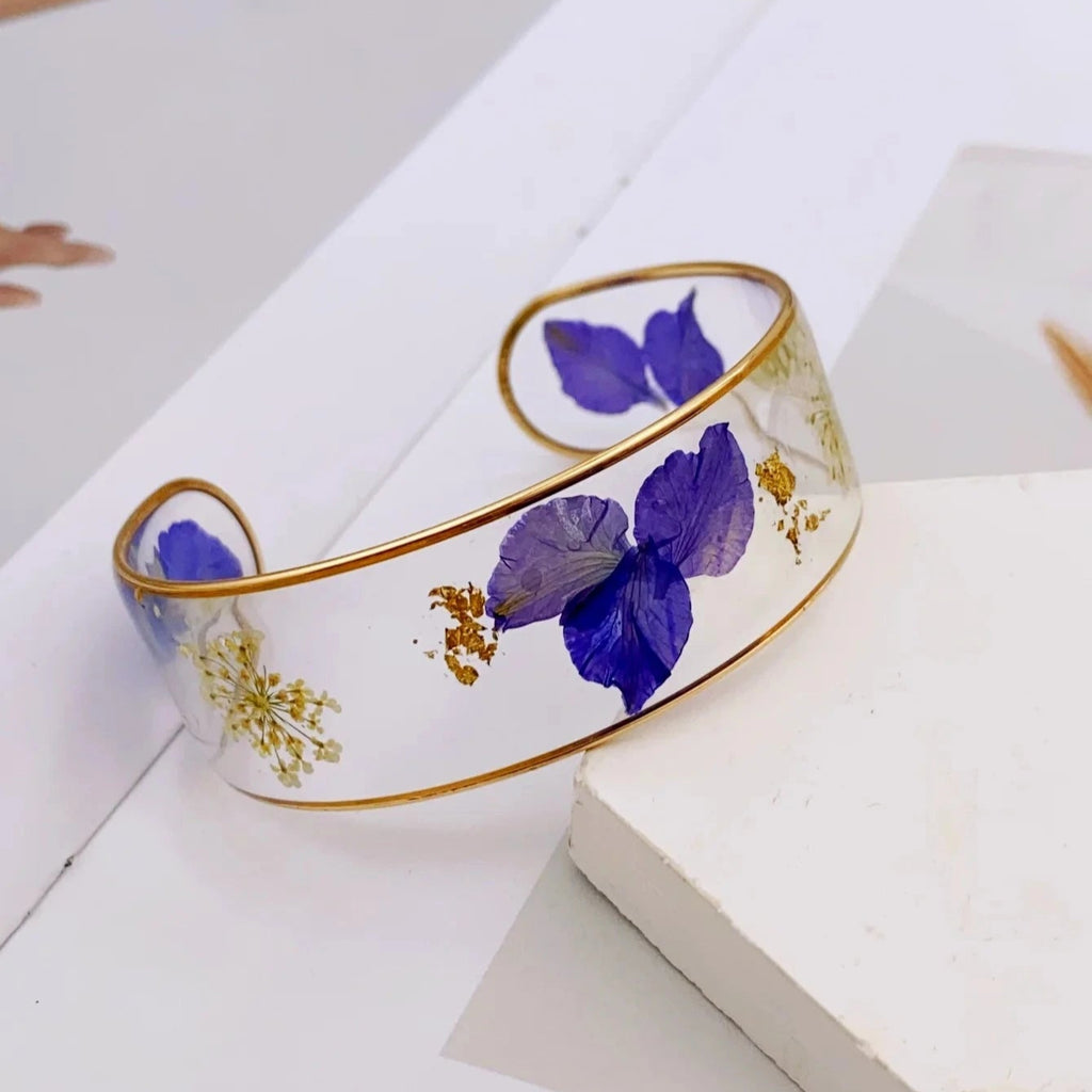 Armband Gourmette Blume aus transparentem dunkelblauem Harz a