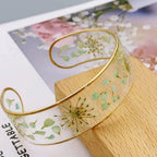 Armband Gourmette Blume aus transparentem grünem Harz a