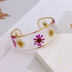 Armband Gourmette Blume aus transparentem rosa Harz b