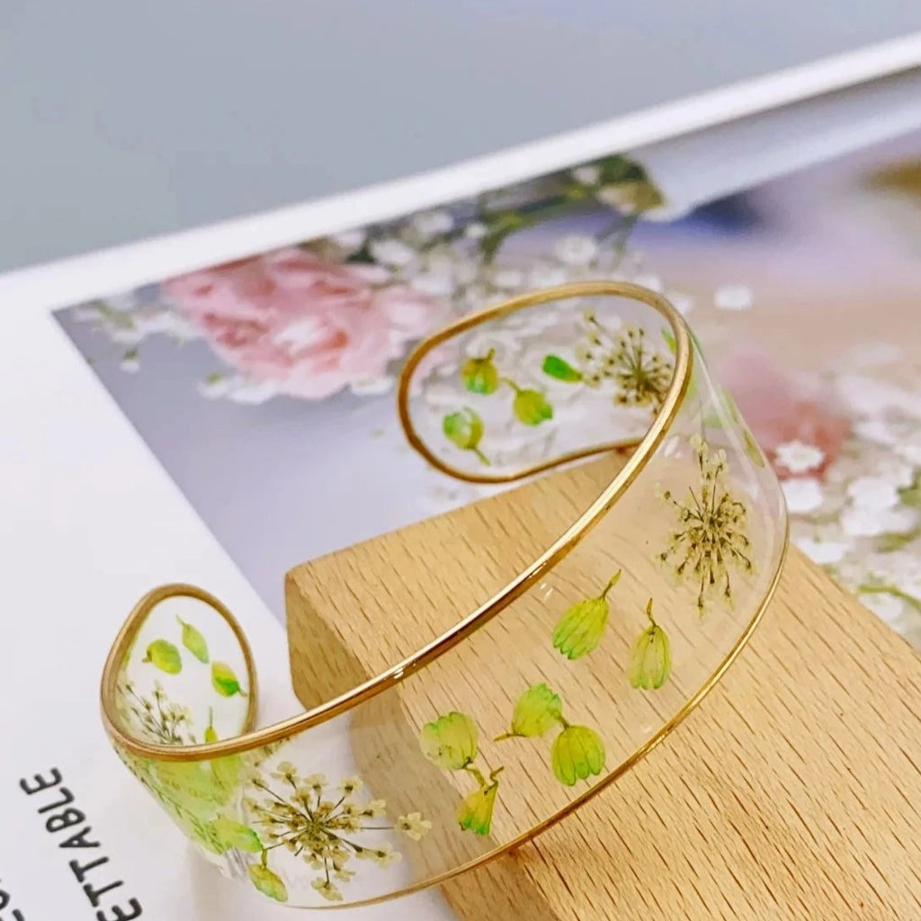 Armband Gourmette Blume aus transparentem grünem Harz a