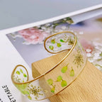 Armband Gourmette Blume aus transparentem grünem Harz a
