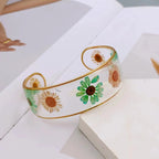 Armband Gourmette Blume aus transparentem grünem Harz b