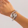Armband Gourmette große asymmetrische Wassertropfen Silber