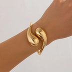 Armband Gourmette große asymmetrische Wassertropfen Gold