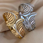 Breites Armband mit silbernem Palmenblatt