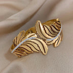 Breites Armband mit goldenem Palmenblatt