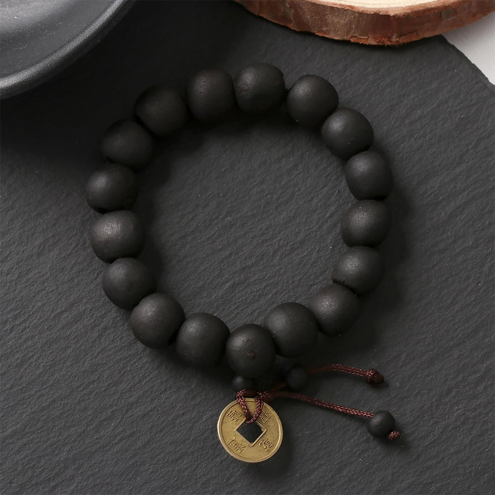 Buddhistisches Gourmet-Armband aus schwarzen Steinen