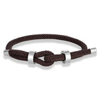 Moderne Armband aus geflochtener Kordel mit braunem Knoten
