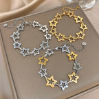 Armband mit mehreren geometrischen Sternen in Gold und Silber