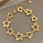 Armband mit mehreren geometrischen Sternen in Gold