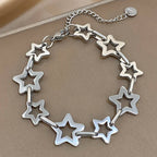 Armband mit mehreren geometrischen Sternen in Silber