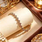 Mehrfach-Kleeblatt-Armband mit farbigen Kristallen in Gold und Rosa