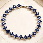 Mehrfach-Kleeblatt-Armband mit farbigen Kristallen in Silber und Blau