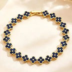 Mehrfach-Kleeblatt-Armband mit farbigen Kristallen in Gold und Blau