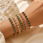 Mehrfach-Kleeblatt-Armband mit farbigen Kristallen in Gold und Grün