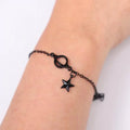 Schwarzes Armband mit Stern