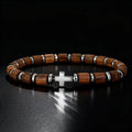 Armband mit Kreuz und Perlen im Holzoptik
