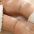 Paararmband Verschlungene Knoten Gold und Silber (Set mit 2 Armbändern)