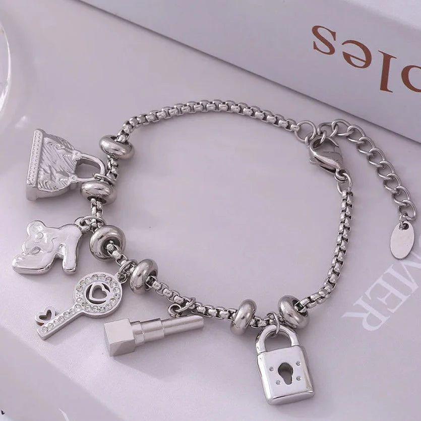 Damenarmband mit Schlüsseln und Schlössern aus Silber