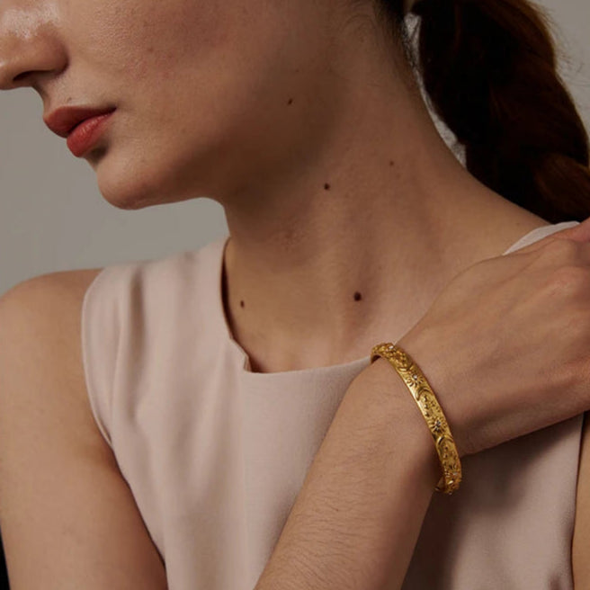 Retro Armband mit Monden und Sonnen und Zirkonia