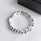 Weißer weißer & schwarzer Totenkopf-Armband