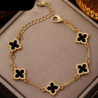 Armband mit vierblättrigem Kleeblatt in schwarzer Perlmuttoptik