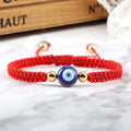 Geflochtenes Armband gegen den bösen Blick Blau Rot und Gold