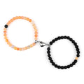 Magnetische Gourmette-Armbänder für Paare mit Sonnenstein- und schwarzen Perlen