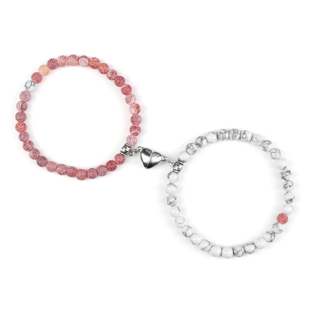Magnetische Gourmette-Armbänder für Paare mit rosa und weißen Perlen