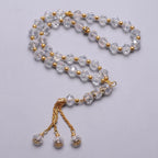 Eleganter muslimischer Rosenkranz - Islamischer Tasbih mit 33 kristallklaren und goldenen Perlen