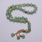 Eleganter muslimischer Rosenkranz - Islamischer Tasbih mit 33 jadegrünen und goldenen Perlen