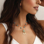 Halskette mit Traumfänger-Anhänger und Türkisperlen